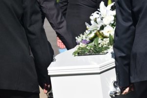 a casket being carried by people